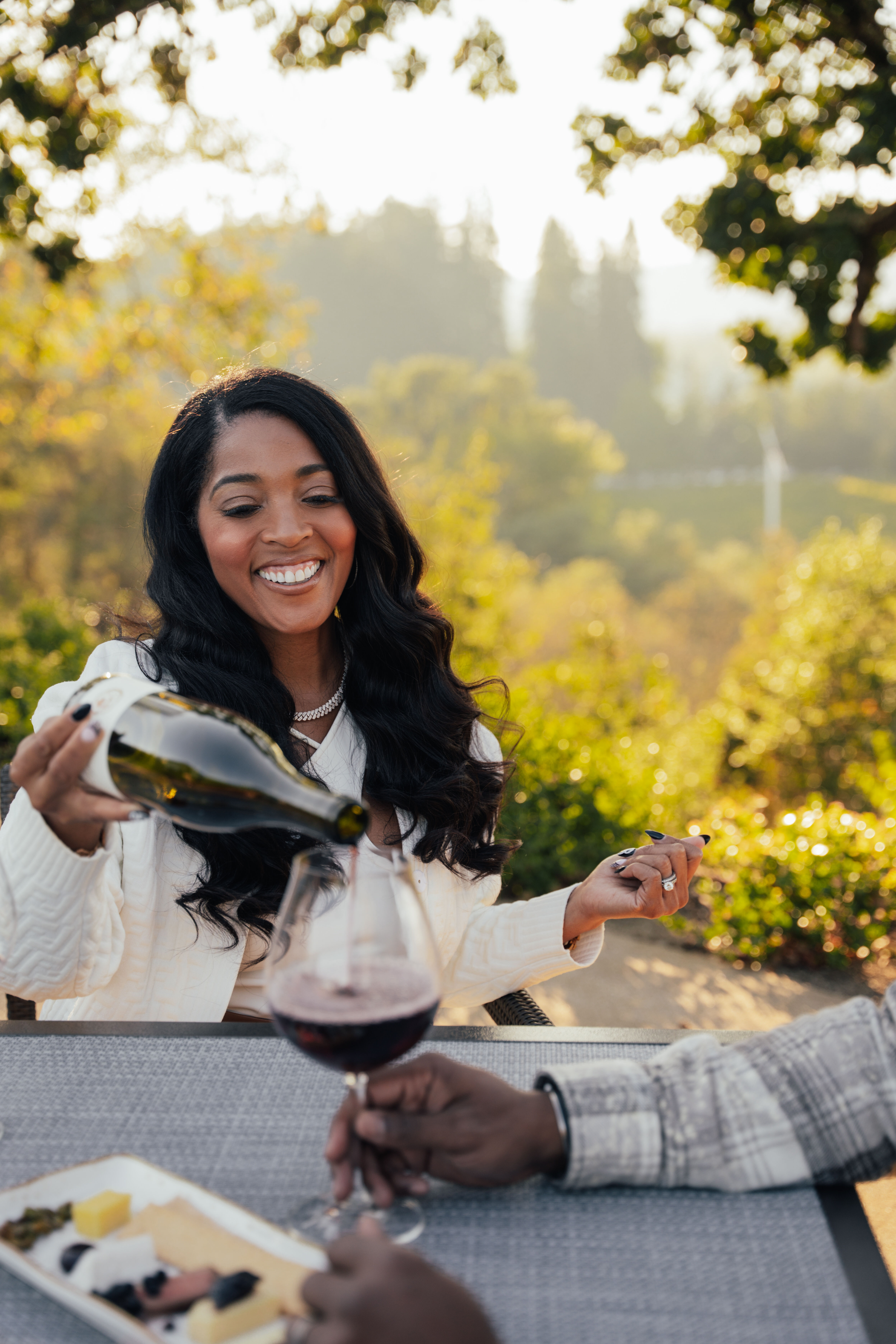 Toya with a glass of wine